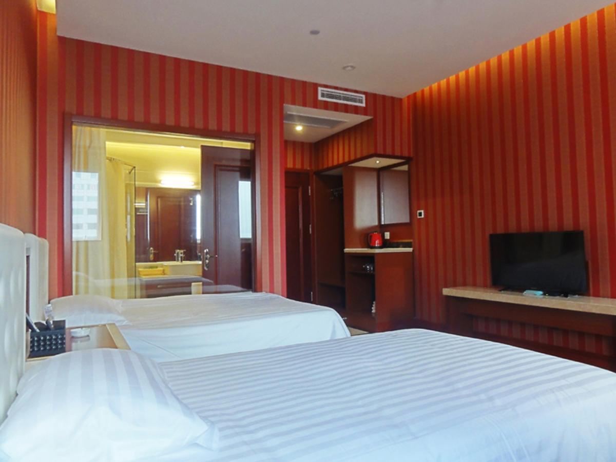 Hua Qi Kaiserdom Hotel Zhongshan Road St Michael'S Cathedral And Zhanqiao Pier Qingdao Extérieur photo