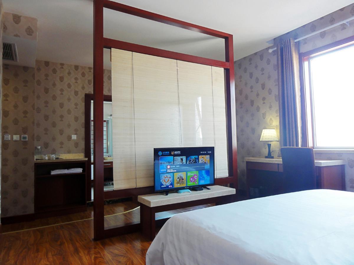 Hua Qi Kaiserdom Hotel Zhongshan Road St Michael'S Cathedral And Zhanqiao Pier Qingdao Extérieur photo